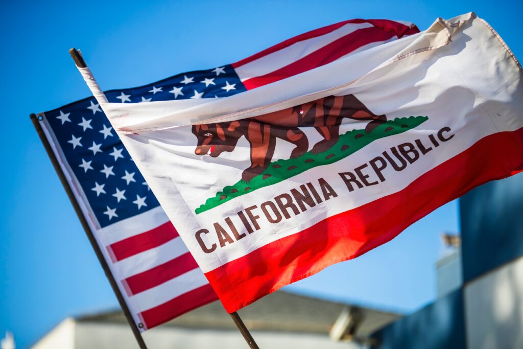 AmericanFlagAndCaliforniaStateFlagWavingSide-by-side
