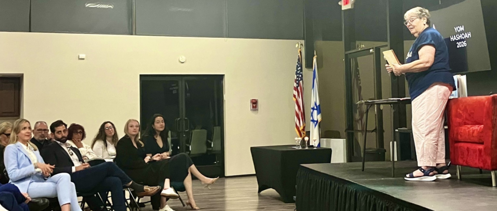 Survivor Carol Roth speaks to a sold-out audience at the IAC Shepher Center